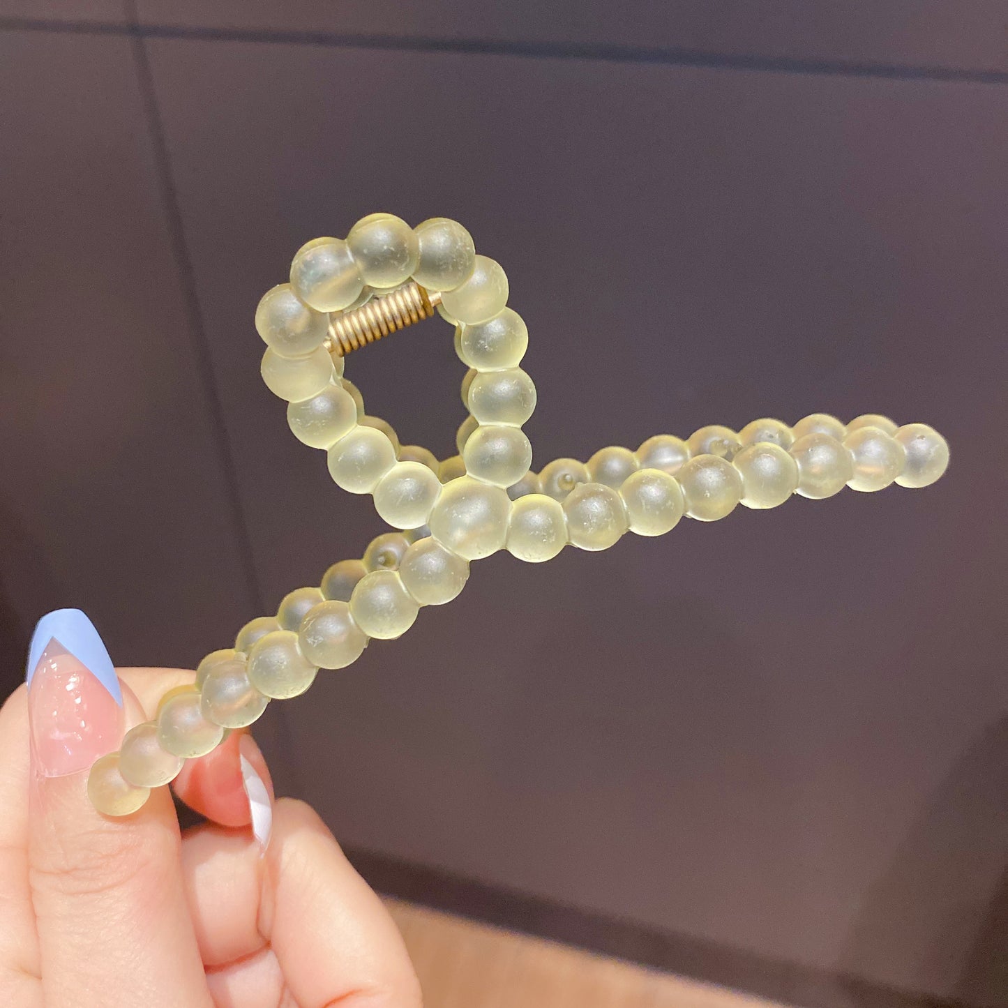 Hårklämma med vriden design - Nordic Glowing