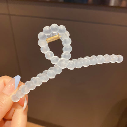 Hårklämma med vriden design - Nordic Glowing