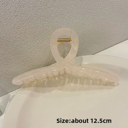 Hårklämma med vriden design - Nordic Glowing